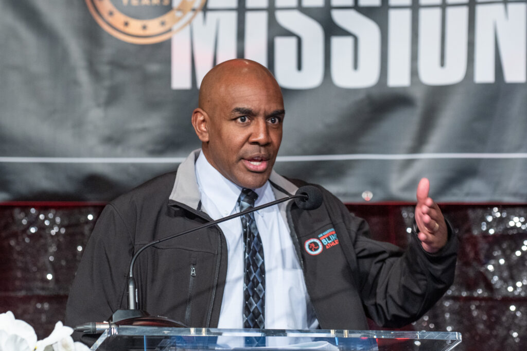 CS Sheffield speaking at NWABA's dinner and auction.